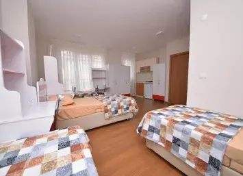 Double room with beds and wardrobes